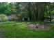 Backyard with a shed and lawn, perfect for outdoor entertaining at 377 Black Oak Ct, Lawrenceville, GA 30046