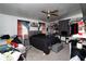 Spacious bedroom with a ceiling fan, carpet, and natural light at 377 Black Oak Ct, Lawrenceville, GA 30046