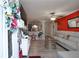 Open-concept living room with a modern sofa and a view of the kitchen at 377 Black Oak Ct, Lawrenceville, GA 30046