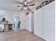 Bright dining area showcasing wood-look floors and modern storage, offering a functional and stylish space at 215 Little Brook Ln, Woodstock, GA 30188
