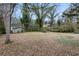 A spacious, tree-lined backyard with plenty of room for recreation and relaxation at 2309 Carver Nw Dr, Atlanta, GA 30314