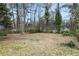 A vast backyard with mature trees, offering privacy and space for outdoor activities at 2309 Carver Nw Dr, Atlanta, GA 30314