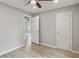 An airy bedroom features wood-look flooring, light gray walls, and white doors at 2309 Carver Nw Dr, Atlanta, GA 30314