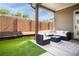 Inviting covered patio with stylish outdoor seating, perfect for entertaining and relaxing in the backyard at 2792 Mathews Se St, Smyrna, GA 30080