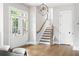 Bright foyer with hardwood floors and staircase at 2792 Mathews Se St, Smyrna, GA 30080