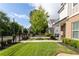Charming home with a lush green lawn, a neatly manicured front yard, and attractive landscaping at 2792 Mathews Se St, Smyrna, GA 30080