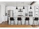 Modern kitchen with white cabinets, stainless steel appliances and granite countertops at 2792 Mathews Se St, Smyrna, GA 30080