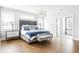Main bedroom boasts a chandelier and ensuite bathroom at 2792 Mathews Se St, Smyrna, GA 30080