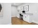 Bright office space with white cabinetry, and a granite countertop desk at 2792 Mathews Se St, Smyrna, GA 30080