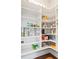 Walk-in pantry features custom shelving for optimal storage at 2792 Mathews Se St, Smyrna, GA 30080