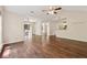 Spacious living area with hardwood floors and access to a patio, offering seamless indoor-outdoor living at 909 Wentworth Ct, Alpharetta, GA 30022