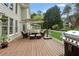 Inviting back deck features an outdoor seating area and grill perfect for relaxing or entertaining at 1029 Ector Nw Dr, Kennesaw, GA 30152