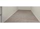 An unfinished basement with carpet and white walls at 1029 Ector Nw Dr, Kennesaw, GA 30152