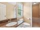 Upstairs bathroom features granite counters, designer fixtures, and a soaking tub at 1029 Ector Nw Dr, Kennesaw, GA 30152