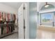 Bathroom with a walk-in closet, soaking tub, tile floor, and stylish finishes at 1029 Ector Nw Dr, Kennesaw, GA 30152