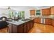 Gourmet kitchen with custom cabinets, granite countertops, and stainless appliances at 1029 Ector Nw Dr, Kennesaw, GA 30152