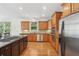 Beautiful kitchen with custom cabinets, stainless appliances, and hardwood floors at 1029 Ector Nw Dr, Kennesaw, GA 30152