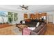 Spacious living room connected to the kitchen, with ample seating and natural light at 1029 Ector Nw Dr, Kennesaw, GA 30152
