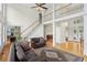 Spacious living room featuring high ceilings, staircase, and hardwood floors at 1029 Ector Nw Dr, Kennesaw, GA 30152