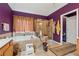 Spacious bathroom with tub, separate shower, and purple accent wall at 2372 Wilshire Way, Douglasville, GA 30135