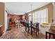 Open-concept kitchen with warm cabinets, stainless steel appliances, and a central island creating a functional space at 2372 Wilshire Way, Douglasville, GA 30135