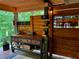 Rustic outdoor bar featuring string lights, ample counter space, and custom woodworking at 2694 Tritt Springs Ne Dr, Marietta, GA 30062