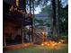 Multi-level deck is shown with string lights and staircase lighting for a relaxing backyard experience at 2694 Tritt Springs Ne Dr, Marietta, GA 30062