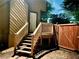 Backyard deck and stairs lead to gated yard area at 2694 Tritt Springs Ne Dr, Marietta, GA 30062