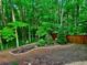 Large backyard with privacy fence and wooded boundary at 2694 Tritt Springs Ne Dr, Marietta, GA 30062