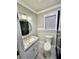 Well-lit bathroom with modern fixtures, granite countertop, and contemporary design at 2694 Tritt Springs Ne Dr, Marietta, GA 30062