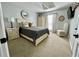 Cozy bedroom features neutral colors, soft carpet, and plenty of natural light at 2694 Tritt Springs Ne Dr, Marietta, GA 30062