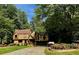 Charming two-story home with mature landscaping, a long driveway, and a two-car garage at 2694 Tritt Springs Ne Dr, Marietta, GA 30062