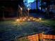 Outdoor staircase is shown with in-stair lighting and landscape lighting for a dramatic backyard view at 2694 Tritt Springs Ne Dr, Marietta, GA 30062