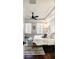 Bright and spacious bedroom with a tray ceiling, windows with shutters, and neutral decor at 312 Stonemont Dr, Atlanta, GA 30305