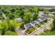 New construction home located in neighborhood with manicured lawns and mature trees at 3123 Cedar St, Scottdale, GA 30079