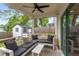 Outdoor seating area on the back porch with cushioned seating and a view of the back yard shed at 3123 Cedar St, Scottdale, GA 30079