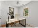 Bright office space with lots of natural light featuring a white modern desk and minimalist decor at 3123 Cedar St, Scottdale, GA 30079