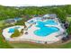 Stunning community pool area with ample seating, kiddie pool, slide, and well-kept landscaping at 423 Murphy Ave, Canton, GA 30114