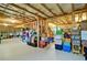 Large unfinished basement for storage, with shelving and boxes at 514 Creekshire Cir, Canton, GA 30115