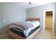 This bedroom offers great natural light and attached closet at 514 Creekshire Cir, Canton, GA 30115