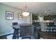 Dining area with hardwood floors, neutral walls, and natural lighting at 514 Creekshire Cir, Canton, GA 30115