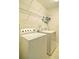 Bright laundry room with side by side washer and dryer and wire shelving at 514 Creekshire Cir, Canton, GA 30115