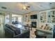 Living room with built-in shelving, fireplace and dark wood floors at 514 Creekshire Cir, Canton, GA 30115