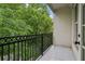Nice balcony with black iron railing and open view at 11 Perimeter E Ctr # 1402, Dunwoody, GA 30346