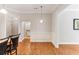 Dining area with hardwood floors connecting the kitchen, bathroom and living spaces at 11 Perimeter E Ctr # 1402, Dunwoody, GA 30346