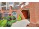 Attractive brick building exterior with manicured landscaping at 11 Perimeter E Ctr # 1402, Dunwoody, GA 30346