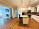 Stylish kitchen with granite counters, stainless steel appliances, and island seating at 11 Perimeter E Ctr # 1402, Dunwoody, GA 30346