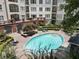 Aerial view of a refreshing pool surrounded by a brick courtyard at 11 Perimeter E Ctr # 1402, Dunwoody, GA 30346