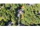 Expansive home with a large pool, well-manicured lawn, long driveway, and surrounded by mature trees at 1191 W Conway Dr, Atlanta, GA 30327
