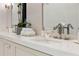 Close-up of the bathroom vanity featuring double sinks, neutral finishes, and modern fixtures at 1191 W Conway Dr, Atlanta, GA 30327